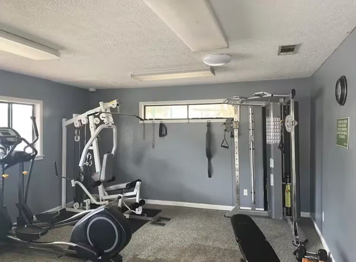 Resort fitness center with weight machines and cardio equipment