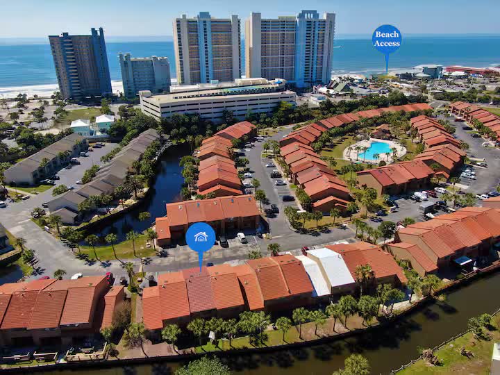Aerial view of the resort showing the townhome and nearby beach access